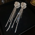 Detail of silver rose earrings with cubic zirconia and long tassels on black tray - Rose Flower Tassel Earrings / Silver Pin-Silver Tassel
