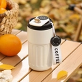 White stainless steel coffee thermos with digital temperature display on wood table - Smart Model / Black