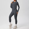 Detail view of a three-piece yoga set with a slim-fit jacket and high-waist leggings - S / Top And Bottom / Graphite Grey