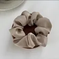 Elegant champagne silk satin oversized scrunchie for ponytails on a wooden display - Medium 8cm / Silver Gray