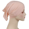 Detail of soft pink modal hijab cap with elastic fabric texture on a model head - One Size / Flesh Pink