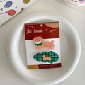 Set di mollette natalizie per capelli con cagnolino marrone e design a quadri verdi - Set da 2 Pezzi Cane con Fiocco