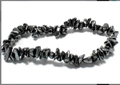Handmade elastic bracelet featuring irregular natural black stone chips for a minimalist look - Hematite