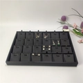 Black jewelry display tray with 24 slots for necklaces and earrings organization - Black Brushed Leather