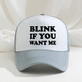 Detail of blue and white trucker hat featuring Blink If You Want Me text with mesh back - One Size / Gray