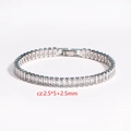 Elegant silver-tone tennis bracelet featuring baguette and square cut cubic zirconia - White Gold (159)