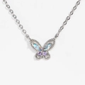 Silver butterfly necklace featuring blue and purple gemstones with a long chain - Platinum