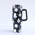 Detail view of 40oz stainless steel tumbler with festive polar bear and penguin prints - Black Polar Bear and Penguin