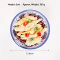 Modelo de patas de pollo con chiles encurtidos en un tazón azul y blanco de 12,6 cm - Patas de Pollo en Escabeche Grande