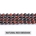 Polished natural mahogany obsidian round beads showing unique red and black textures - Natural Mahogany Obsidian 6mm/Approx 60pcs