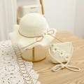 Detail of straw hat and matching bag set with lace edges and daisy decorations - 54cm / Hat + Bag Set / Cream