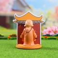 Cute monk resin figurine in orange robe with prayer beads on a Zen display stand - 1034-23C Buddhist Heart Set
