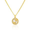 Macro shot of gold Pisces zodiac necklace pendant featuring intricate CZ stone setting - Pisces Necklace