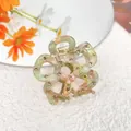 French hollow five-petal flower hair claw in green marble acetate with sparkling rhinestones - Olive Green