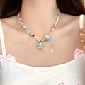 Colorful acrylic beaded necklace with heart and star charms on a female model - Acrylic Heart Butterfly Star Colorful Patchwork Style
