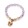 Elegant beaded bracelet with lavender beads and an amber crystal butterfly pendant - Butterfly Style / Purple