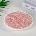 Natural raw pink rose quartz crystal stones presented on a white decorative dish - 100g Of Artificial Watermelon Crystal (3-5mm)
