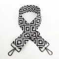 Detail of black and white geometric diamond weave bag strap with dark metal hardware - Style 2 Gunmetal Buckle