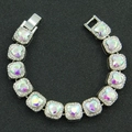 Macro view of silver Cuban chain with heart-shaped iridescent rhinestones and pavé detail - 7" / Silver (Multicolor Rhinestone)