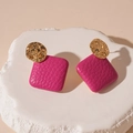 Close-up of geometric earrings featuring hammered gold metal and magenta leather texture - Silver Needle - Pink Leather Square Stud Earrings