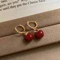 Red apple earrings with gold hoop and crystal leaf on a vintage book background - 75# Earring Buckle Gold Red Real Gold Enamel Red Apple