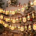 LED Christmas light string with Santa, Snowman, and Tree shapes in warm white glow - Multicolor Mixed Battery 1.5m 10LED