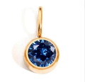 Macro view of gold-plated stainless steel pendant with round dark blue gemstone - September Royal Blue (0.8cm*0.8cm)