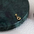 Polished gold letter G pendant with spherical clasp on a green marble background - Letter Pendant (G) / Gold