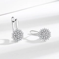 Elegant silver flower earrings with pavé zircons shown on a white minimalist background - White Gold Pair / Silver