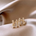 Elegant gold-plated H-letter stud earrings featuring sparkling pavé crystals and waves - Letter H Style / Gold