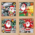 Christmas window decals with Santa Claus, penguins, and snowflakes on a wooden window pane - 4 Pieces Combo Set 3