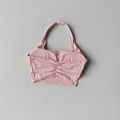 Detail of pink halter sports bra with ruched chest design and high elasticity fabric - Pink