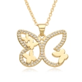 Gold-plated butterfly pendant necklace with cubic zirconia on a white background - F234
