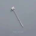 Minimalist S999 sterling silver threader earring featuring a polished letter W pendant - Letter W