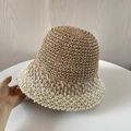 Detailed view of hand-crocheted straw bucket hat with brown and beige gradient knit - M (56-58cm) / Khaki
