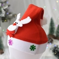 Close-up of a festive red felt Christmas hat with a 3D reindeer and sequined snowflake brim - Kids Non-Glow Reindeer