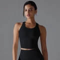 Detalle del conjunto de yoga negro sin costuras con tela de compresión transpirable - S / Negro