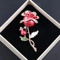 Elegant red enamel rose brooch with sparkling white rhinestones in a luxury jewelry box - Dark Red Enamel Rhinestone Rose