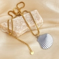 Detail of the lobster clasp, extender chain, and silver shell pendant on bicolor box chain - Two-tone Shell Necklace