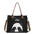 Schwarze Panda Stofftasche aus Segeltuch mit braunen Trägern und viel Stauraum - Schwarz