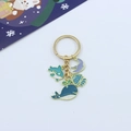 Detail of gold keychain featuring ocean-themed whale, jellyfish, and ray enamel charms - Whale/Stingray/Jellyfish/Small Fish