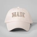 Pink cotton baseball cap featuring floral MADE text and Ephesians 2:10 graphic print - One Size / Beige