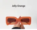 Detail view of retro jelly orange square sunglasses with gradient brown lenses - Jelly Orange