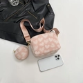 Pink heart embossed crossbody bag with matching round pouch and wide shoulder strap - Pink