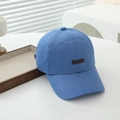 Close-up of blue cotton baseball cap featuring high-quality DINO letter embroidery - 54cm 3-8 Years Old / Blue