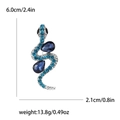 Spilla a forma di serpente argento retrò con strass blu e cristalli su fondo bianco - Base d'Argento / Blu