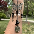 Silver butterfly suncatcher with black stone beads and celestial sun moon metal pendant - Obsidian