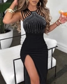 Close-up of elegant black halter dress with rhinestone patterns and a side slit - S / Tops / Black