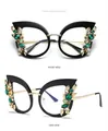 Black cat-eye glasses frame with green rhinestones and clear lenses in side-front view - Black Frame Clear Lens