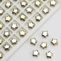 Macro shot of 8mm gold star metal charms and glass beads for DIY jewelry making - Plated Light Gold